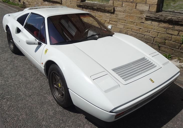 Ferrari F328 GTS LHD Euro Spec presented in white with red interior