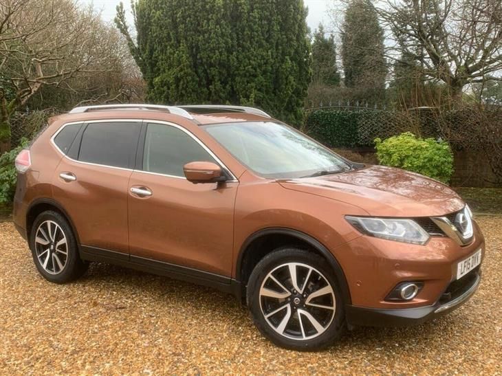 orange nissan x trail